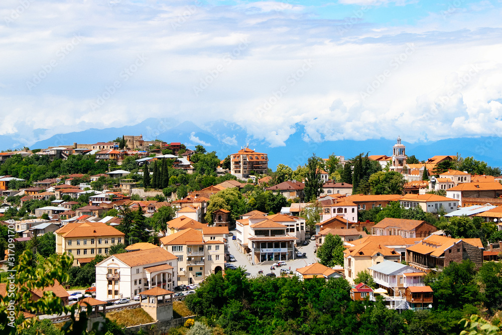 City with tiled roofs on the mountain