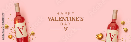 Happy Valentines Day. Design with realistic two bottles of alcohol wine red varieties, chocolate candies in gold foil, golden 3d hearts and glitter confetti. Romantic background