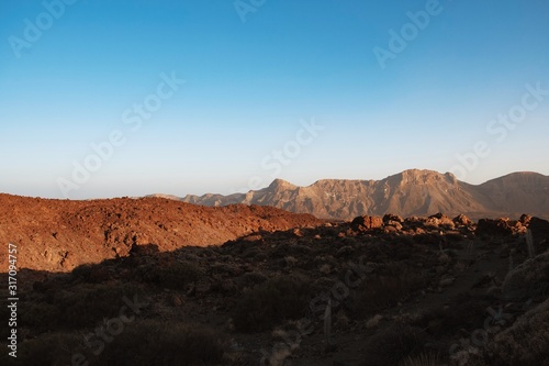 View of volcanic scene teide desert rocky plain sunset landscape © longviewart