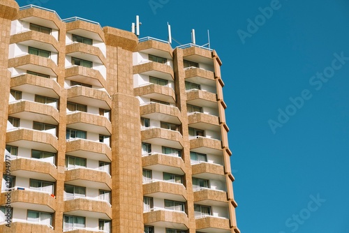 Concrete modernist building sunny day blue sky 