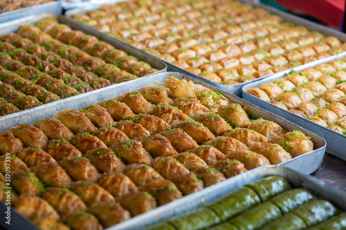 Turkish national sweets at the street shop. Baklava and delights Turkish cusine.