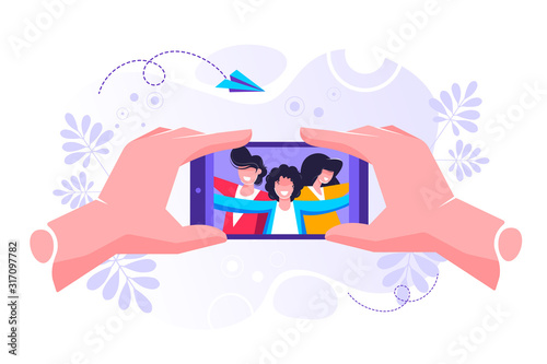 Hand holding smartphone with photo