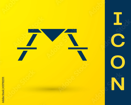 Blue Picnic table with benches on either side of the table icon isolated on yellow background.  Vector Illustration