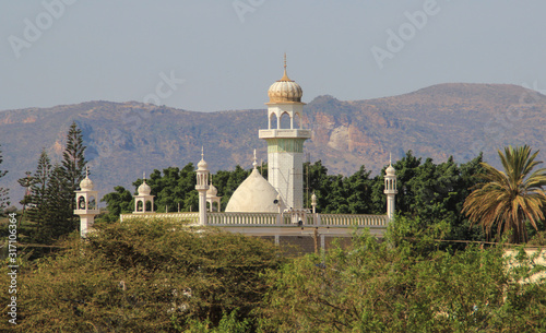 Nairobi, Kenya - February 28, 2015: a beautiful white decorated mosque on a background of mountain