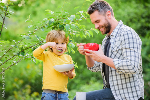 Nutrition habits. Family enjoy homemade meal. Healthy breakfast. Father son eat food. Little boy and dad eat. Nutrition kids and adults. Tasty porridge. Organic nutrition. Healthy nutrition concept