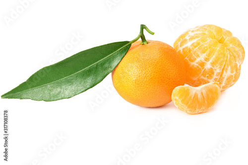 mandarin with slices and green leaf isolated on white background