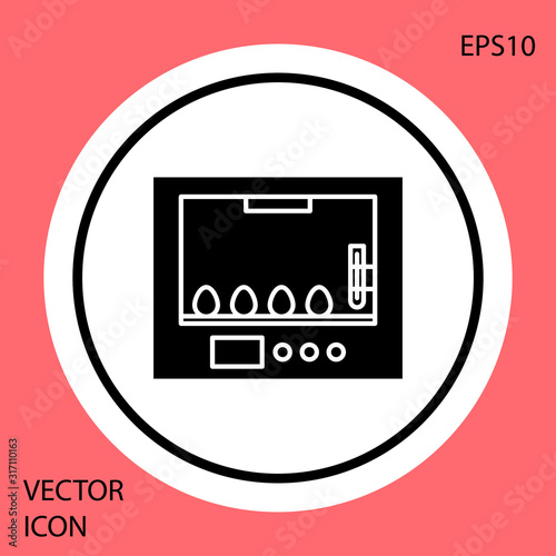 Black Incubator for eggs icon isolated on red background. White circle button. Vector Illustration