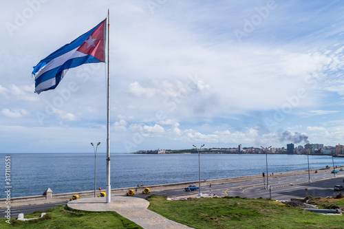 Cuban flag over the waterfront photo