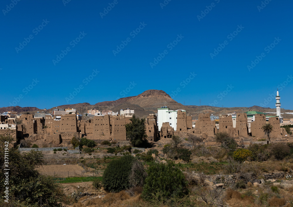 Traditional old multi-storey mud houses, Asir province, Dahran Aljanub, Saudi Arabia Traditional old multi-storey mud houses, Asir province, Dahran Aljanub, Saudi Arabia