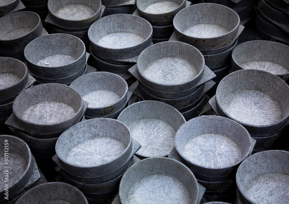 Natural stone kitchen bowls plates for sale in a shop, Najran Province, Najran, Saudi Arabia Natural stone kitchen bowls plates for sale in a shop, Najran Province, Najran, Saudi Arabia