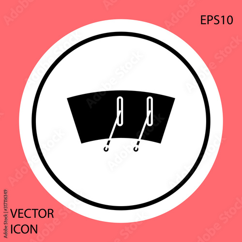 Black Windscreen wiper icon isolated on red background. White circle button. Vector Illustration