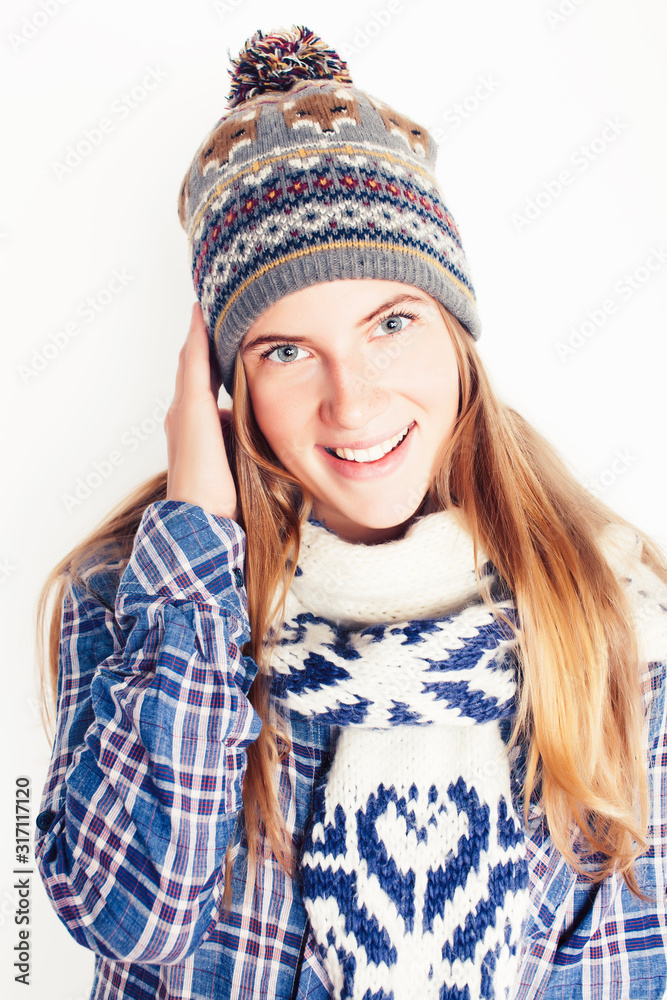 young pretty blond woman in hat and winter scarf smiling cheerful on white background, lifestyle people concept young pretty blond woman in hat and winter scarf smiling cheerful on white background, lifestyle people concept