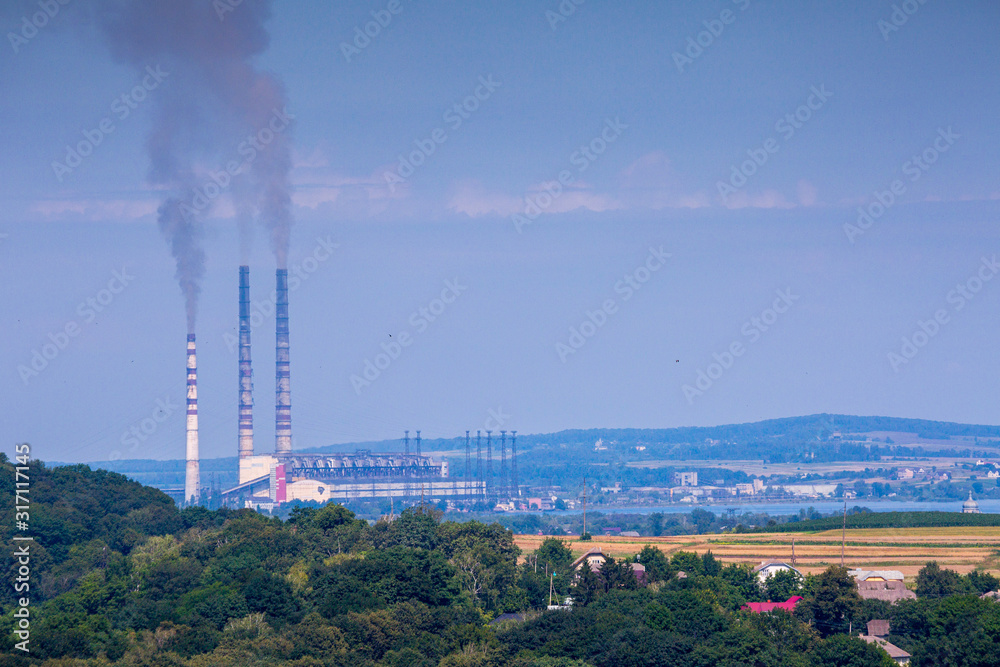 The largest air pollutant in western Ukraine is coal-fired power plant Burshtyn TES. 2 flue gas stacks 250 meters in height and one 180 emit 500 tons of harmful substances a day into the atmosphere.