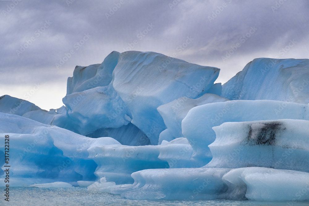 Blue hour after a autumn sunset at Jokulsarlon lagoon - Iceland Blue hour after a autumn sunset at Jokulsarlon lagoon - Iceland