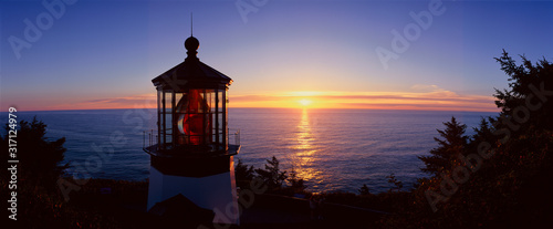 Cape Meares Lighthouse At Sunset, Cape Meares, Oregon photo