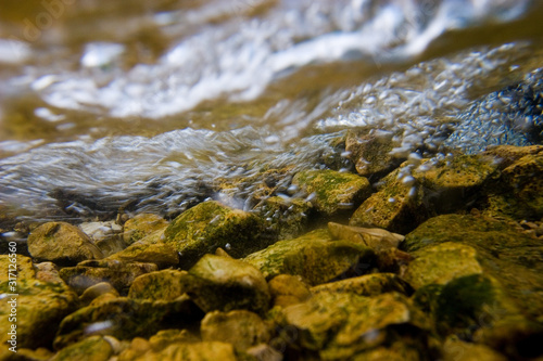 Rocky river bottom of the Licka Jesenica River photo