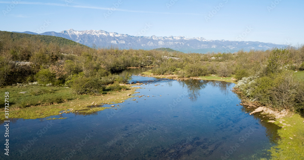 The intermittent river Suvaja, in Lika and Velebit, in early spring The intermittent river Suvaja, in Lika and Velebit, in early spring