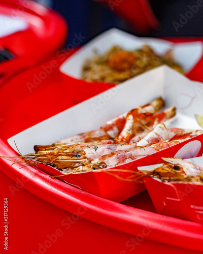 shrimp at the counter of the street food festival photo