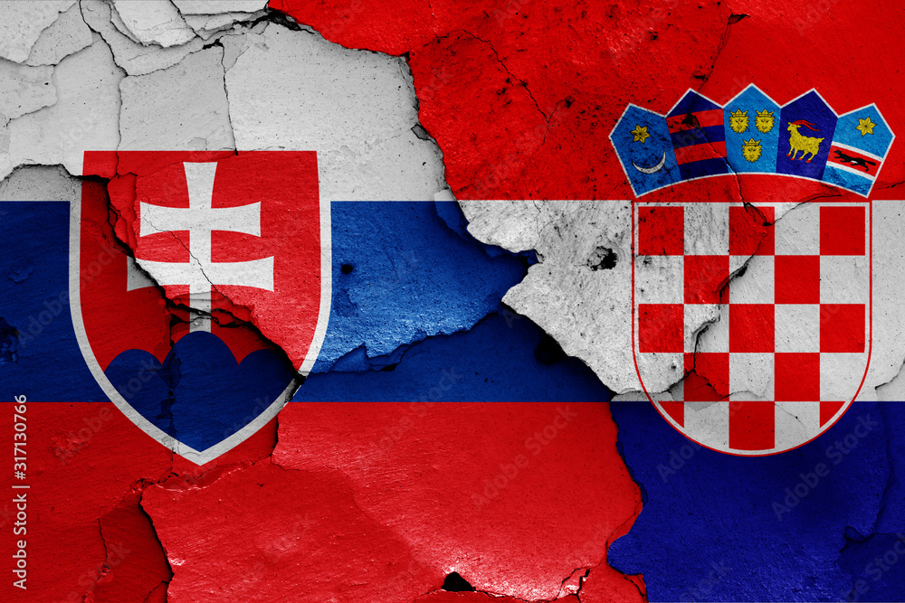flags of Slovakia and Croatia painted on cracked wall