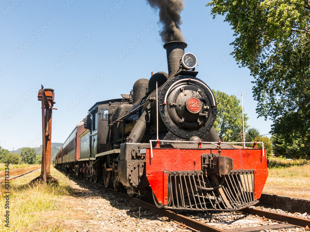 Obraz premium Tourist train called Valdiviano that runs from Valdivia to Antilhue with a 1913 North British locomotive type 57. Los Rios Region, in southern Chile.