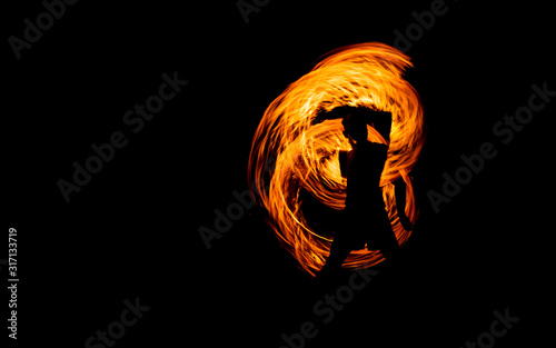 juggling with fire, show steel wool or swing fire and light on the beach dance man, Rotating lights