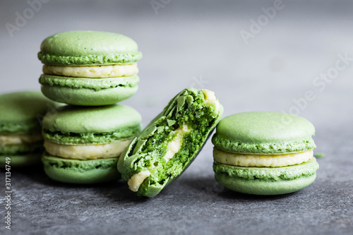 Matcha macarons with mango buttercream photo