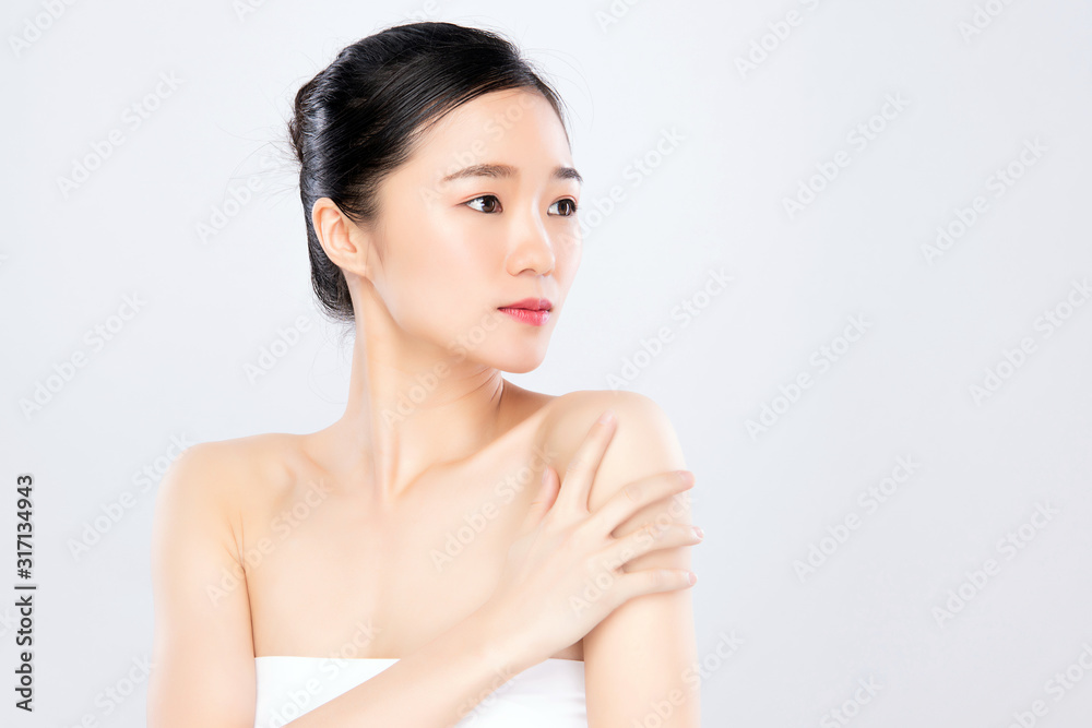 Beautiful Young Asian Woman with Clean Fresh Skin. Face care, Facial treatment, on white background, Beauty and Cosmetics Concept. Beautiful Young Asian Woman with Clean Fresh Skin. Face care, Facial treatment, on white background, Beauty and Cosmetics Concept.