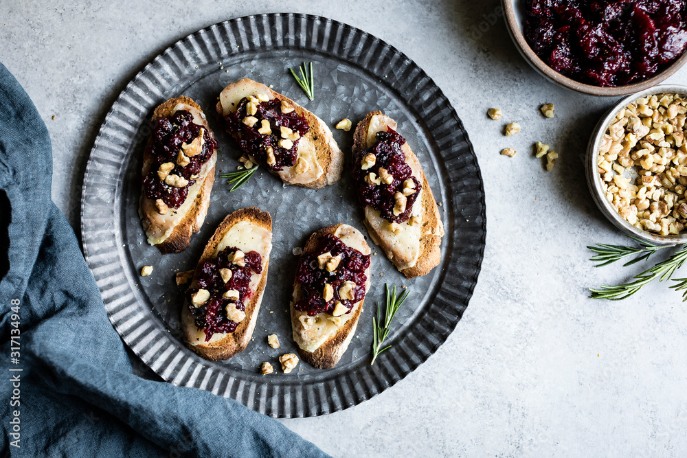 Cheese crostini with rosemary cranberry fig jam