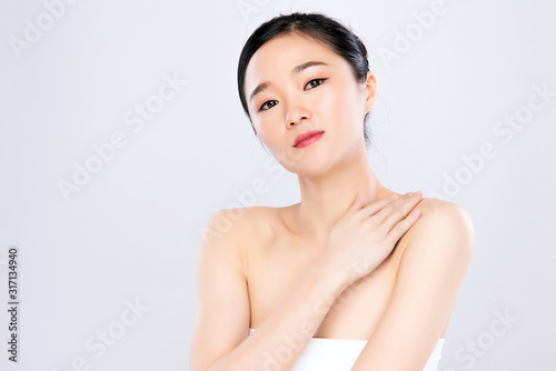 Beautiful Young Asian Woman with Clean Fresh Skin. Face care, Facial treatment, on white background, Beauty and Cosmetics Concept.