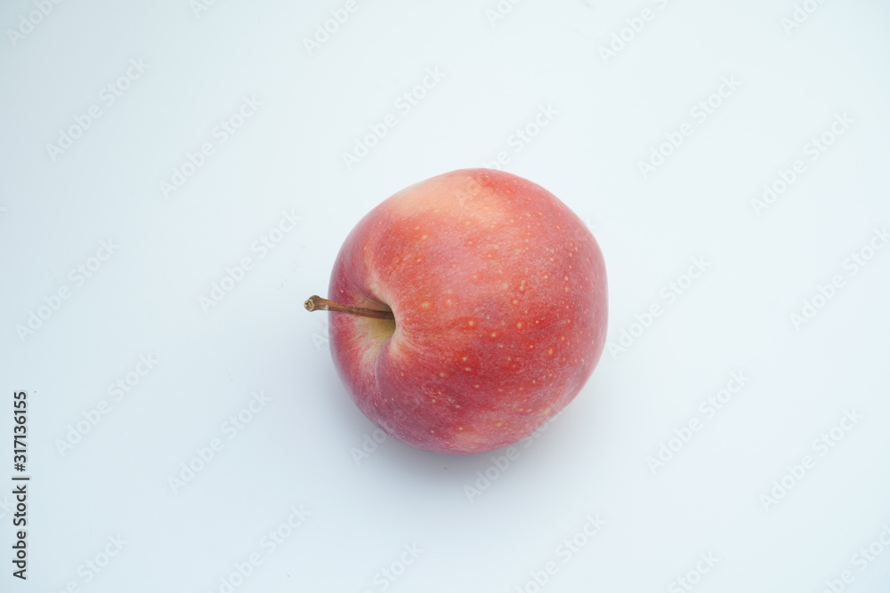 Fototapeta premium Fresh red apple on white background.