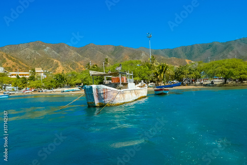 rustic fishing boat at anchor