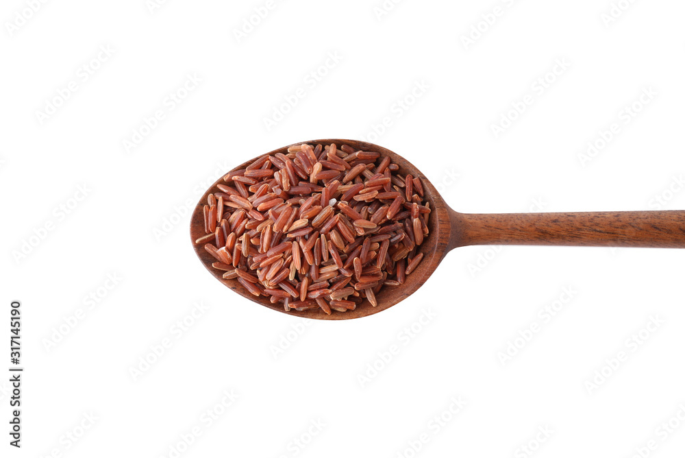 Brown rice in spoon isolated on white, top view Brown rice in spoon isolated on white, top view