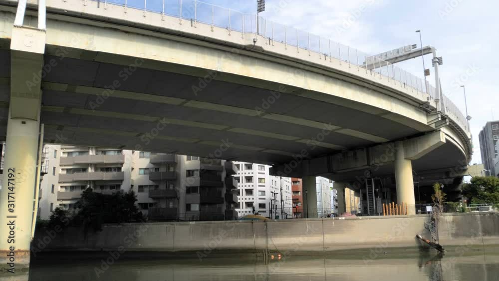 Under the big long bridge in the city in Tokyo Japan Under the big long bridge in the city in Tokyo Japan