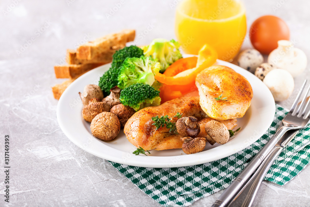 Healthy lunch - chicken fillet, mushrooms, broccoli and paprika. Selective focus. Copy space Healthy lunch - chicken fillet, mushrooms, broccoli and paprika. Selective focus. Copy space