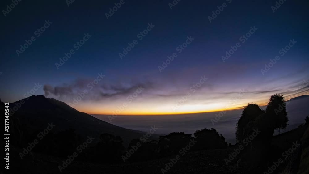 Night Time lapse near of the active Turrialba Volcano in Costa Rica at beautiful sunrise. Night Time lapse near of the active Turrialba Volcano in Costa Rica at beautiful sunrise.