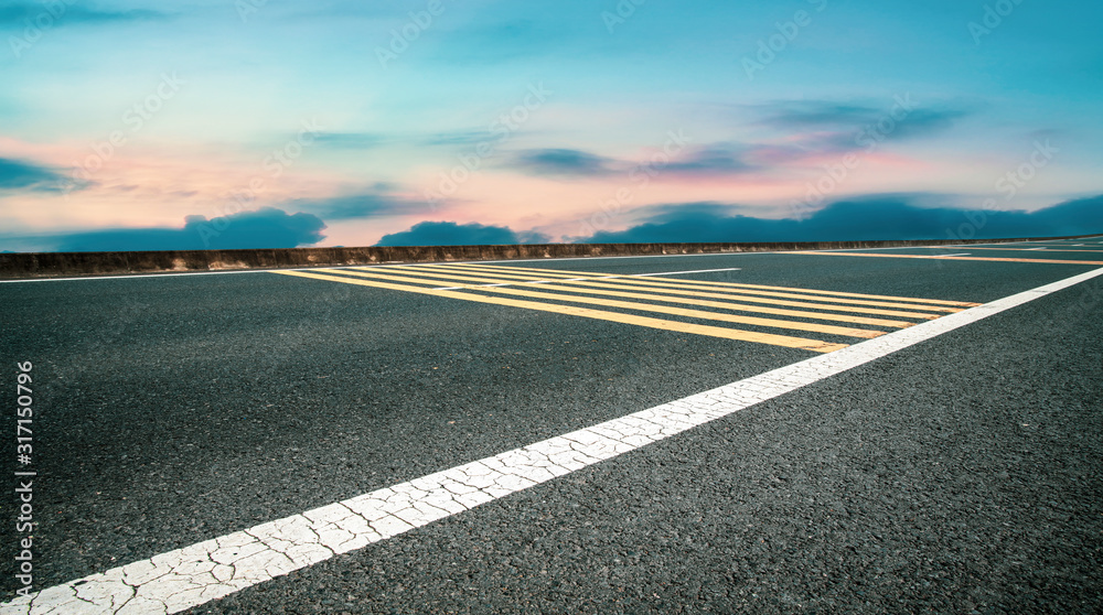 Asphalt Highway Skyline and Blue Sky and White Cloud Asphalt Highway Skyline and Blue Sky and White Cloud