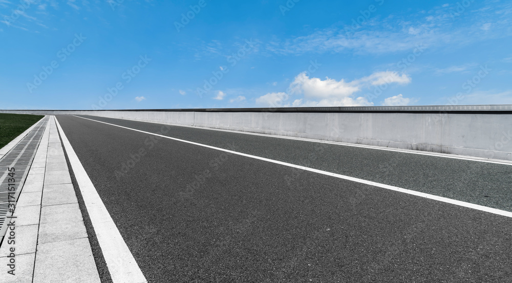 Fototapeta premium Road surface and sky cloud landscape..