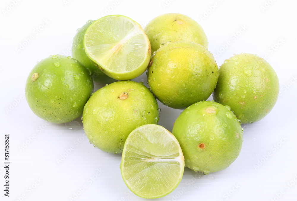Fresh lime with water drops Isolated on white