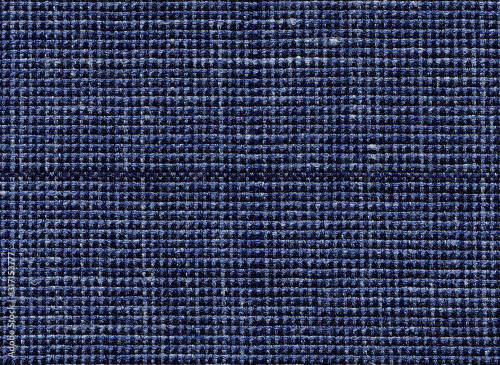 Lana Virgin wool extra fine. Shades of Ultramarine, Navy blue natural fabric with visible weave texture. Expensive men's suit fabric. High resolution Lana Virgin wool extra fine. Shades of Ultramarine, Navy blue natural fabric with visible weave texture. Expensive men's suit fabric. High resolution