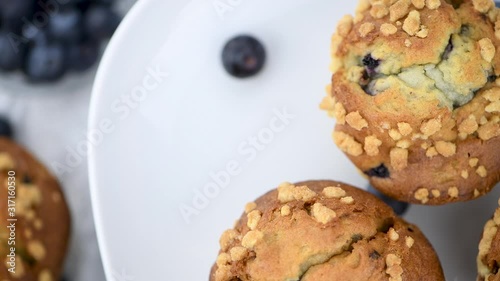 Fresh made Blueberry Muffins on a rotating plate (seamless loopable)