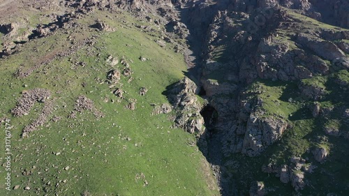 Grigorievskoe gorge in the summer in Kungei Alatau. Kyrgyzstan.  Forest, Alpine meadows and glaciers. photo