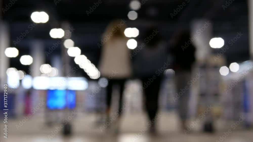 Blur motion of people shopping inside an electric store with 4k resolution Blur motion of people shopping inside an electric store with 4k resolution