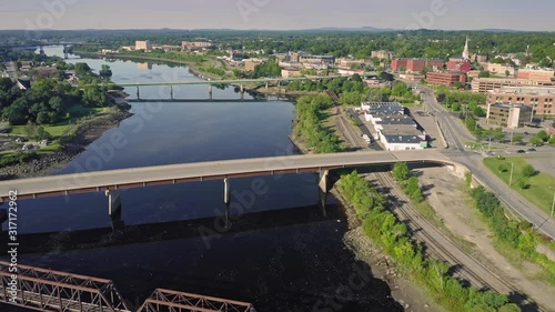 Aerial: Flying over bridges crossing the Penobscot River. Bangor, Maine, USA photo