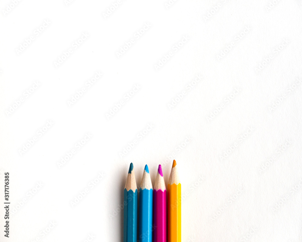 multicolored pencils at the bottom of the album sheet copyspace multicolored pencils at the bottom of the album sheet copyspace