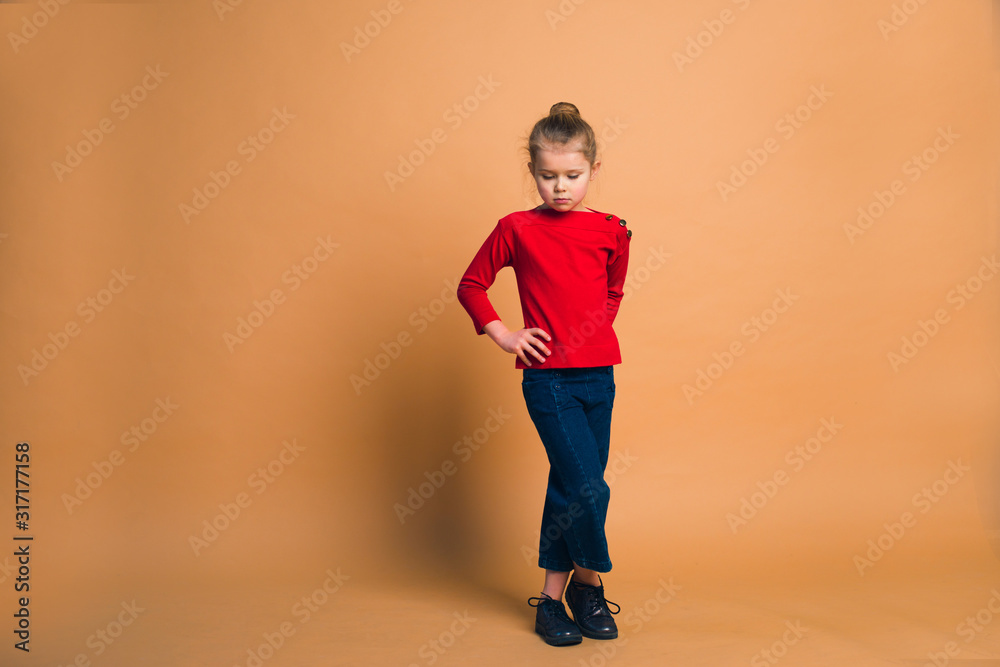fashion shot cute girl posing on color background in studio