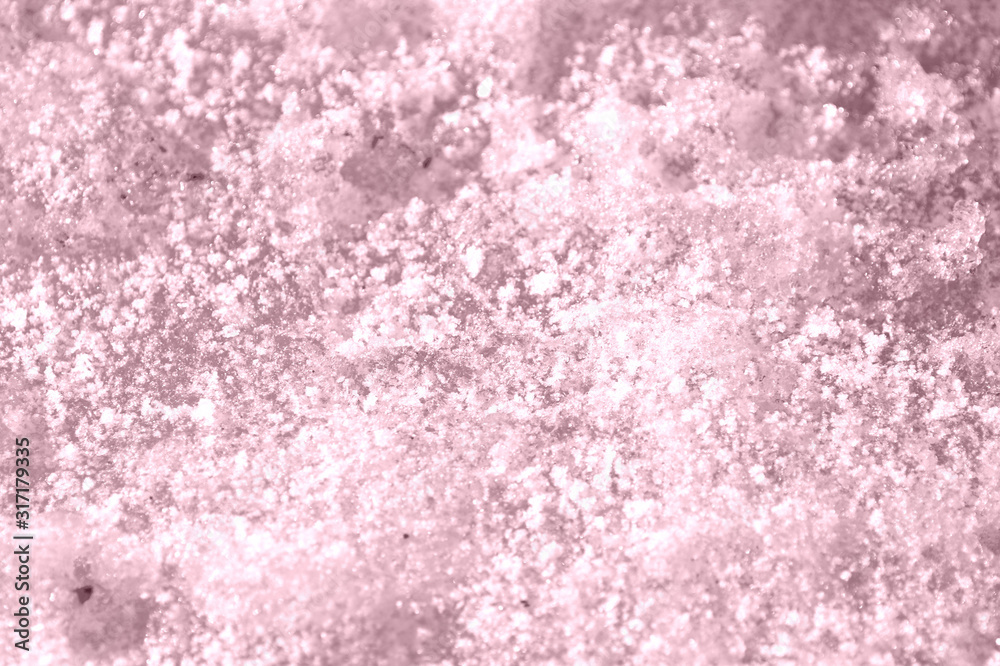 Spring snow texture close up. Abstract winter background pink color toned Spring snow texture close up. Abstract winter background pink color toned