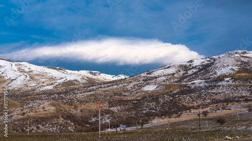 Beautiful cloud over a mountain range © Vastram