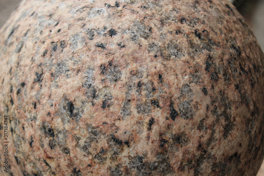 Closeup of a sphere shaped marble stone. Closeup of a sphere shaped marble stone.