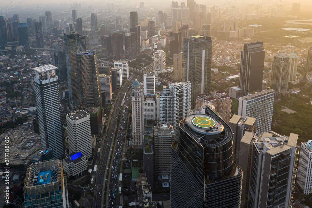 Fototapeta premium Stunning sunset over Jakarta business district in Indonesia capital city in Southeast Asia