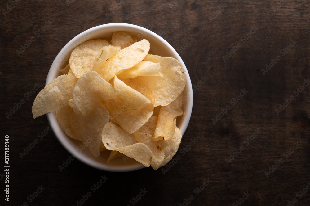 Potato chips heaping in a bowl